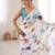 White color chinon fabric designer printed elegant saree with swarovski work