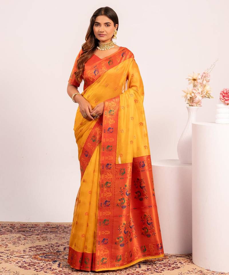 Yellow color beautiful ethnic woven designer tissue silk saree