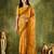 Yellow color bollywood style printed chiffon saree for ethnic party looks