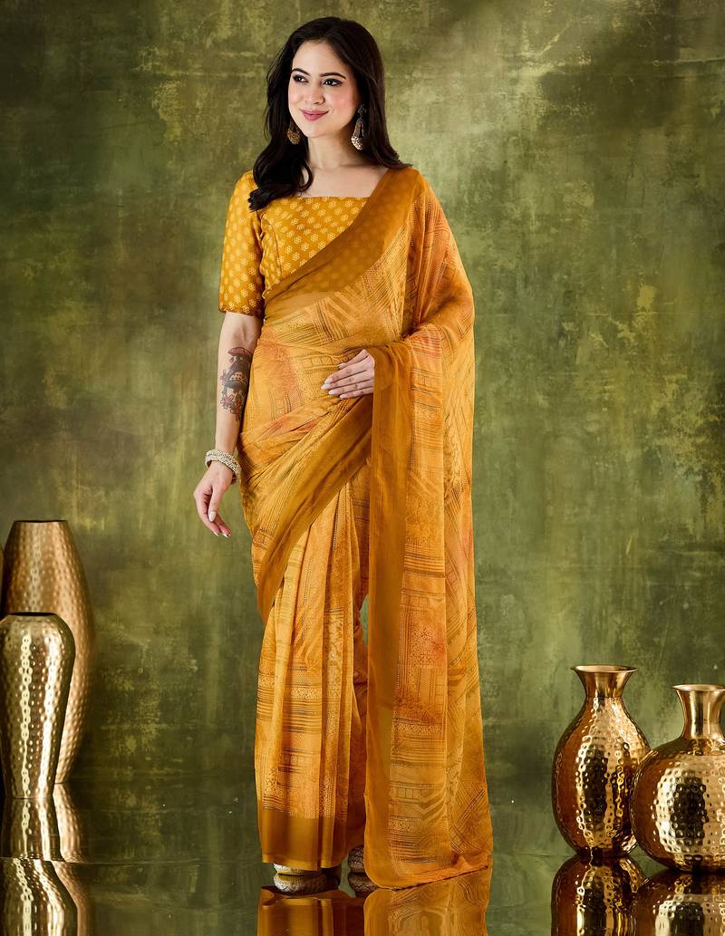 Yellow color bollywood style printed chiffon saree for ethnic party looks
