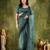 Rama color bollywood style printed chiffon saree for ethnic party looks