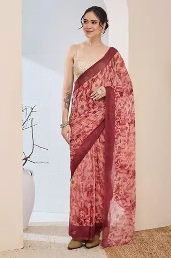 Rust color bollywood style printed chiffon saree for ethnic party looks