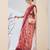 Rust color bollywood style printed chiffon saree for ethnic party looks