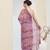 Purple color bollywood style printed chiffon saree for ethnic party looks