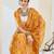 Yellow color bollywood style printed chiffon saree for ethnic party looks