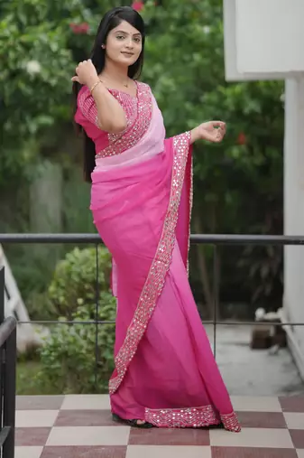 Pink faux georgette padding saree with smart and trendy mirror work