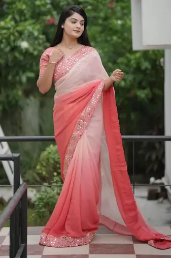 Peach faux georgette padding saree with smart and trendy mirror work