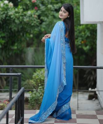 Blue faux georgette padding saree with smart and trendy mirror work 2
