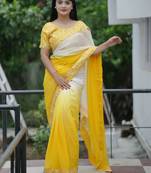 Yellow faux georgette fabric beautiful padding saree with smart and trendy mirror work