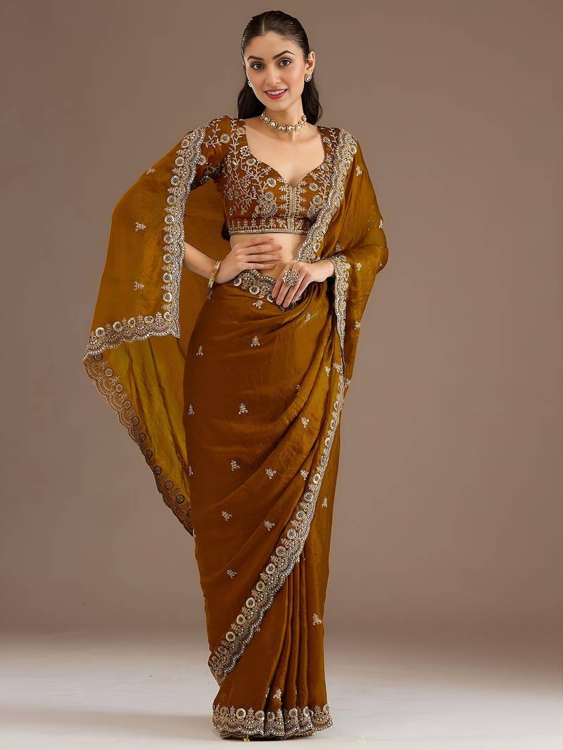 Gold color stylish tissue fabric designer embroidered fancy ethnic partywear saree