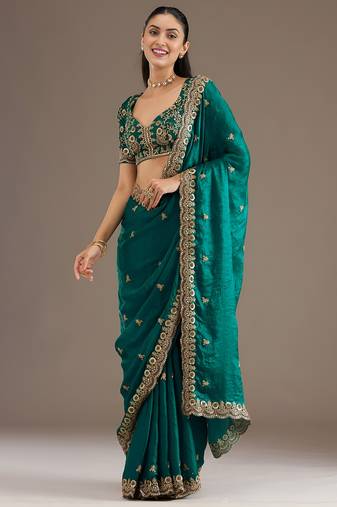 Rama color stylish tissue fabric designer embroidered fancy ethnic partywear saree