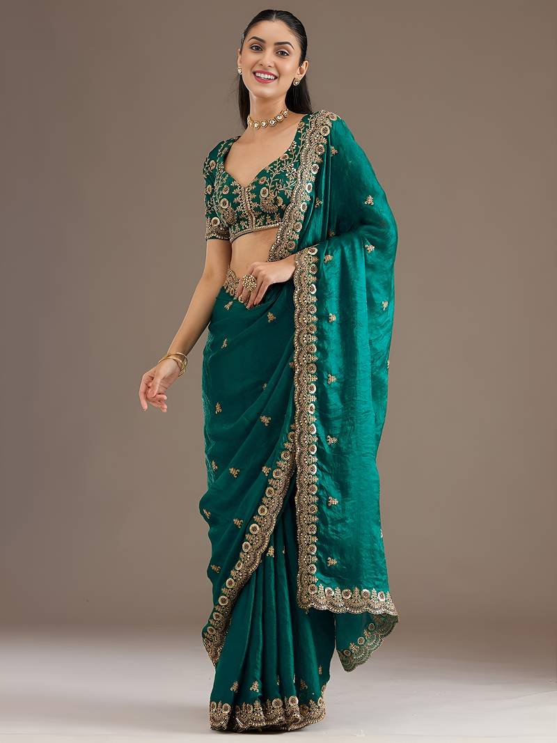 Rama color stylish tissue fabric designer embroidered fancy ethnic partywear saree
