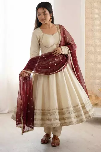 Off White Color Lace Work With Kali Cutting Work Cosmos Silk Gown Set
