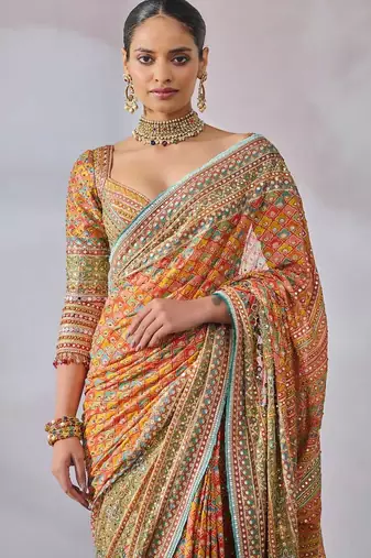Orange chinon silk blendsaree with mirror work