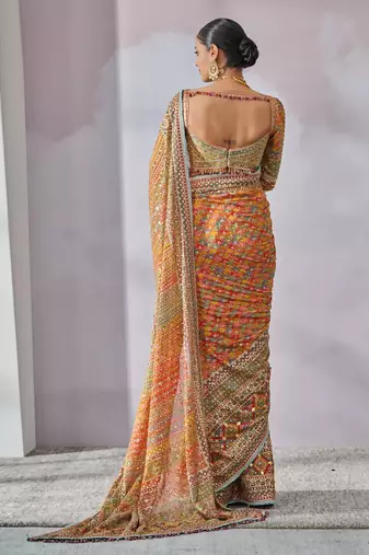Orange chinon silk blendsaree with mirror work