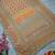 Orange chinon silk blendsaree with mirror work