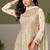 Faux georgette cream embroidered readymade palazzo suit semi stitched up to 42" size