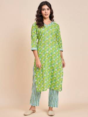 Green v neck tunic with striped palazzo co ords 1
