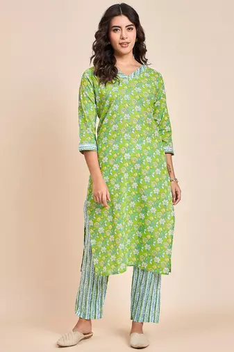 Green v neck tunic with striped palazzo co ords