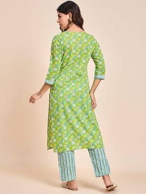 Green v neck tunic with striped palazzo co ords 3