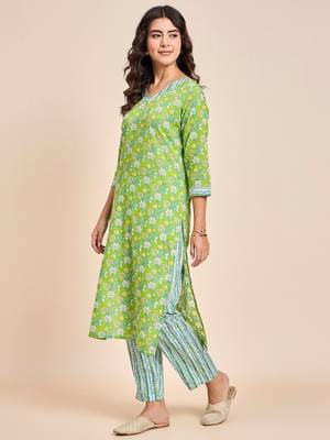 Green v neck tunic with striped palazzo co ords 4