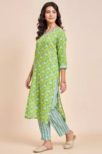 Green v neck tunic with striped palazzo co ords