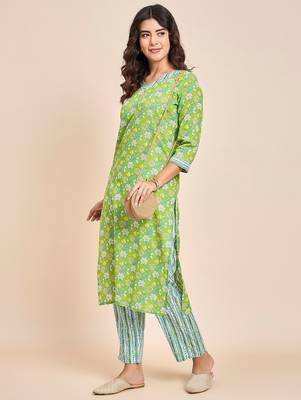 Green v neck tunic with striped palazzo co ords 5