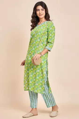 Green v neck tunic with striped palazzo co ords