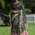 Green color tussar silk lotus print sarees