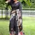 Navy blue color tussar silk lotus print sarees