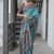 Firozi color tussar silk temple border print sarees