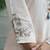 Women's cream muslin cotton embroidered mandarin neck kurta set with dupatta