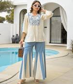 Women's cream rayon embroidered v-neck luxury kurta set with aqua palazzo