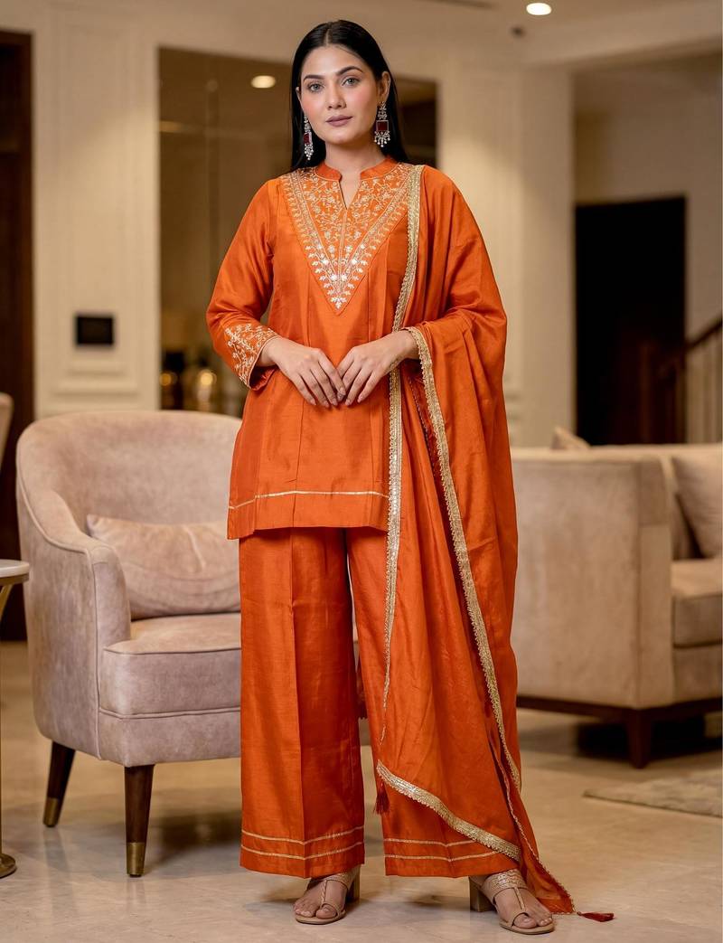 Women's orange vichitra silk embroidered v-neck luxury kurta set with dupatta