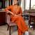 Women's orange vichitra silk embroidered v-neck luxury kurta set with dupatta