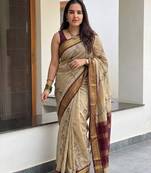 Beige blended cotton embroidered zari work saree with blouse