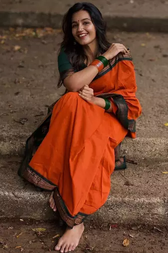 Orange dark green blended cotton woven zari work saree with blouse