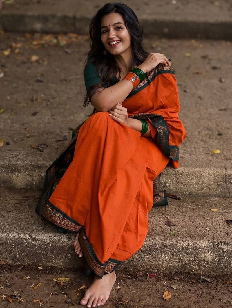Orange dark green blended cotton woven zari work saree with blouse