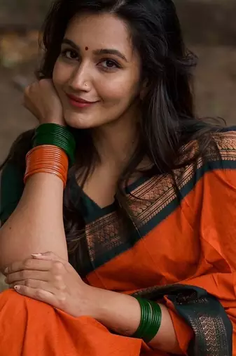 Orange dark green blended cotton woven zari work saree with blouse