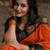 Orange dark green blended cotton woven zari work saree with blouse