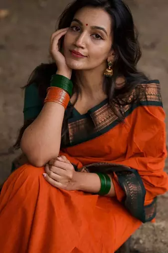 Orange dark green blended cotton woven zari work saree with blouse