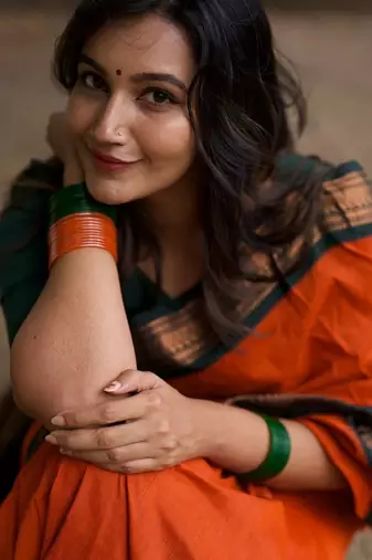 Orange dark green blended cotton woven zari work saree with blouse