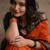 Orange dark green blended cotton woven zari work saree with blouse