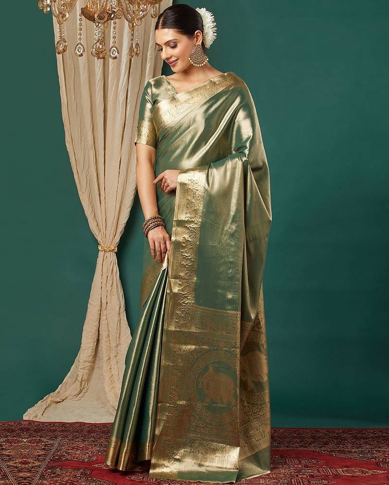 Dark green pure silk woven zari work saree with blouse