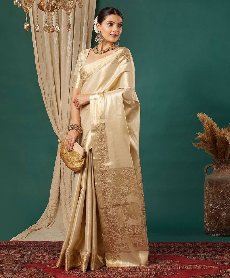Beige pure silk woven zari work saree with blouse