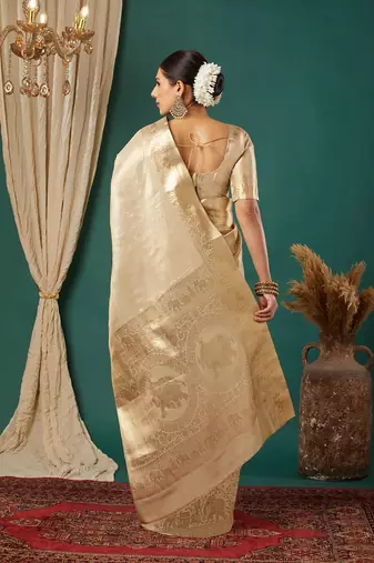 Beige pure silk woven zari work saree with blouse