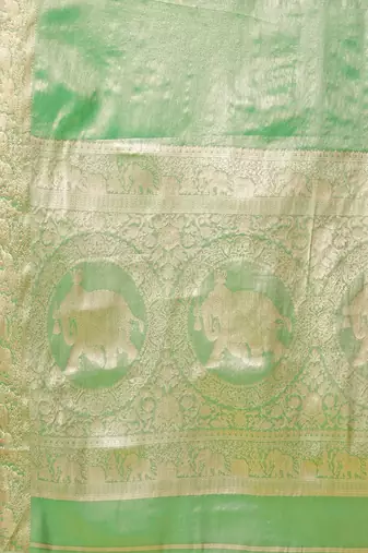 Light green pure silk woven zari work saree with blouse