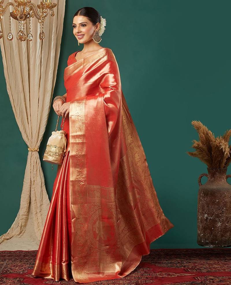 Orange pure silk woven zari work saree with blouse