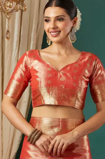 Orange pure silk woven zari work saree with blouse
