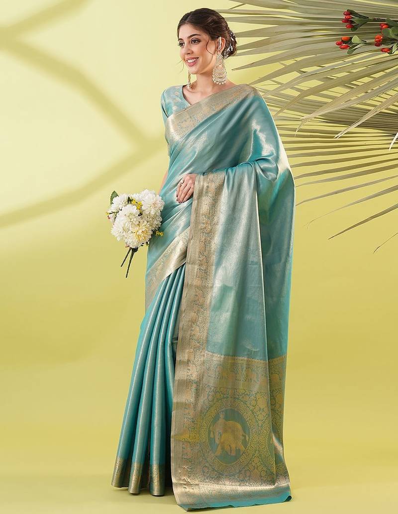 Light green pure silk woven zari work saree with blouse